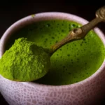 Whisking matcha powder in a bowl to unlock Matcha Tea Benefits naturally.