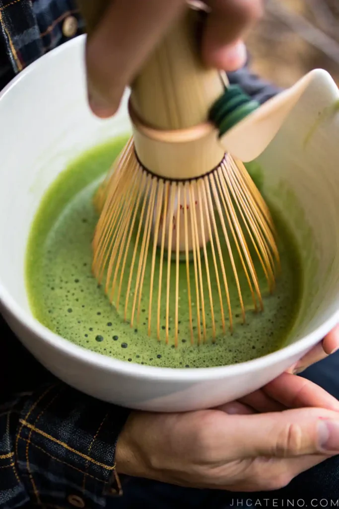 Japanese Green Tea prepared with bamboo whisk for energy and focus.